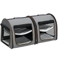 Gray pet carrier with mesh sides on a white background